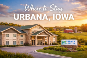 Urbana Inn & Suites hotel exterior with scenic countryside in Urbana Iowa at sunset